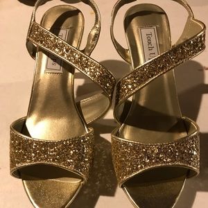 Glitzy gold strapy shoes